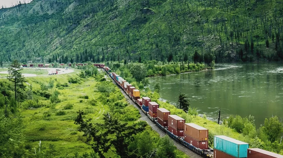 Supply chain illustration from BCG - cargo train traveling through beautiful landscape